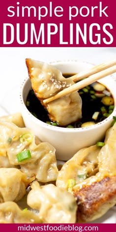 some dumplings are being served with chopsticks