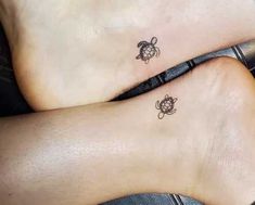 two people with matching tattoos on their legs, one has a turtle and the other is a turtle