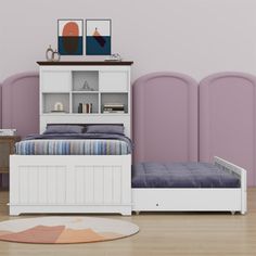 a white bed sitting next to a book shelf on top of a hard wood floor