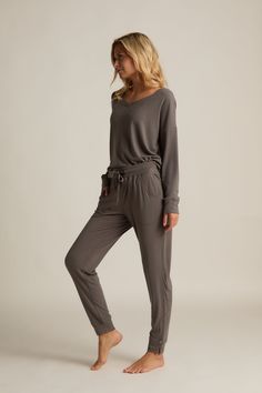 Our new Söft Collection starts with the softness of bamboo. Söft Lounge leggings and a tank with bralette have just enough stretch to hug you gently but let you be free. The entire collection is softer than soft. It’s Faceplant Söft. Söft joggers have non-binding elastic and drawstring waist for easy lounging. Scooped side pockets Side slits at cuffs fit comfortably over your ankles. Tight enough to look sleek but loose enough to feel cozy. Söft charcoal and Söft grey color selections flow beaut Versatile Relaxed Fit Yoga Pants For Lounging, Spring Yoga Pants For Loungewear, Versatile Yoga Pants For Spring Loungewear, Versatile Comfortable Activewear For Relaxation, Comfortable Versatile Activewear For Relaxation, Versatile Yoga Pants For Lounging, Relaxed Stretch Activewear For Lounging, Comfy Activewear Long Pants For Lounging, Versatile Relaxed Fit Activewear For Loungewear