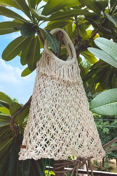 Our Omaja bag is the epitome of a perfect island life beach bag. Our take on the classic fisherman style, the Omaja has been handwoven by our artisan friends in Turkey, and was designed as a multi-purpose bag; from days at the beach, to running errands around town. Eco-friendly Macrame Straw Bag For Vacation, Eco-friendly Macrame Tote Bag, Summer Weaving Natural Color Bags, Summer Macrame Beach Bag For Everyday, White Macrame Vacation Bag, Beige Macrame Beach Bag, Summer Vacation Macrame Bags, Summer Natural Shoulder Bag With Weaving Detail, Natural Macrame Bag For Daily Use