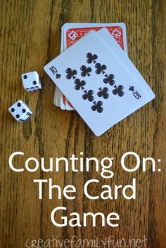 some cards and dice on a table with the words counting on the card game above them