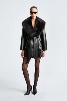 Kelsey - Nour Hammour Luxury Fall Fur Coat With Faux Fur Trim, Luxury Fur Coat With Faux Fur Trim For Fall, Luxury Leather Jacket With Lapel Collar For Fall, Fitted Sheepskin Outerwear For Fall, Chic Leather Fur Coat For Work, Chic Fur Coat With Padded Collar, Fall Leather Fur Coat With Faux Fur Trim, Chic Winter Leather Jacket With Padded Collar, Luxury Sheepskin Fur Coat For Fall