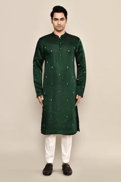 Sacramento green kurta featuring hand embroidery in the front and sleeves. Paired with a white pyjama. - Aza Fashions Green Ceremonial Kurta For Transitional Season, Transitional Green Kurta For Ceremonial Occasions, Green Kurta For Ceremonial Occasions, Transitional Season, Green Ceremonial Kurta For Eid, Green Cotton Bandhgala For Diwali, Green Sherwani For Traditional Ceremonies During Transitional Season, Green Ceremonial Kurta For Diwali, Green Cotton Bandhgala With Chikankari Embroidery, Ceremonial Green Long Sleeve Kurta