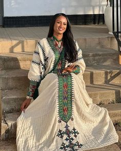 This elegant Habesha dress is a timeless representation of Ethiopian culture. As an Ethiopian traditional dress, this Habesha Kemis embodies the rich heritage and artistry of Ethiopia. Perfect for special occasions, its classic design and cultural significance make it a must-have for anyone looking to honor tradition with style. Material Cotton Thread Estimated delivery : 1 week to 2 weeks Contact WhatsApp +1(304)-306-2784Email: contact@ethiopian.store Ethiopia Clothing, Habesha Kemis Ethiopian Dress, Eritrean Clothing, Amhara Culture, Cultural Clothes, Hebrew Clothing, Eritrean Dress, Ethiopian Culture, Ethiopian Clothing