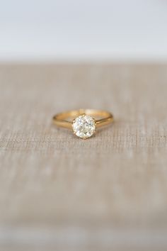 Hand-crafted 18K yellow gold diamond solitaire by Single Stone, named Blaire. It's a modish solitaire with old world charm as the gallery is beautifully scalloped like a queens crown 👸. The center stone is an old European cut diamond that sparkles like a firecracker! 1.37 ct. old European cut, M color, VS1 clarity and EGL US certified Handcrafted 18K yellow gold Do you love this ring? Yes! The ring can be made with a different center stone, price and the setting is also available in rose gold, Single Stone Diamond Rings For Women, Single Stone Rings For Women, Single Stone Rings Gold For Women, Single Stone Ring Design, Single Diamond Ring For Women, Queens Crown, Single Diamond Ring, Woman In Gold, Single Stone Ring