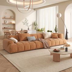 a living room filled with lots of furniture and decor