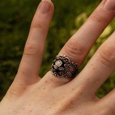 Victorian style antiqued adjustable filigree ring.At its center is a 10x8mm black and white rose cameo.This ring is adjustable to most sizes. Available in antiqued silver or bronze as well as other cameo colors. Each ring comes in a gift box. Cameo Ring, Minerals And Gemstones, Filigree Ring, Green Rose, Pink Ring, Fantasy Jewelry, Blue Rose, Summer Jewelry, Blue Rings