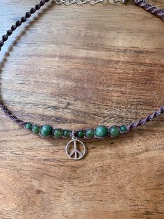 -Hemp macrame peace sign beaded choker necklace.  -Length- 14-16  inches -Agate is for strength and courage, & protects its wearer from danger and to promote healing.  -Each intricate knot and carefully chosen bead was crafted with positive energy and precision, making this piece a true work of art. Macrame Peace Sign, Hemp Macrame, Crystal Bead Jewelry, Jewelry Hippie, Hippie Necklace, Necklace Crystal, Beaded Choker Necklace, Themed Jewelry, Choker Necklaces