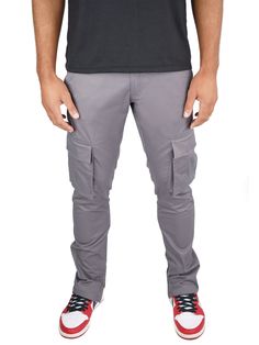 Have what you need, when you need it while sporting the Strategy Cargo Pant. With six pockets overall, two utility pockets on the front and two on the back, there is a pocket for everything. This pant features a comfortable waistband that sits at your natural waist while the legs have a tapered fit. They’re made from 100% cotton making them the perfect pant for everyday wear. This product is unisex and runs true to size. Please refer to the size guide listed on our website to purchase the perfec Gray Bottoms With Pockets For Outdoor Activities, Gray Cargo Bottoms For Outdoor Activities, Gray Cargo Pants For Outdoor Activities, Gray Cargo Pants With Pockets For Outdoor Activities, Gray Cotton Cargo Pants For Outdoor, Gray Pants With Hip Pockets For Outdoor Activities, Gray Pants With Pockets For Outdoor, Gray Outdoor Pants With Pockets, Outdoor Gray Cotton Cargo Pants