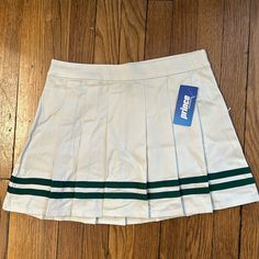 Prince Pickleball Women’s Mid-Rise Striped Pleated Mini Skirt In Cream. I Ordered A Small (As Pictured On Tag) But Someone Pointed Out That The Fabric Tag Says Xs. I’d Say It Fits More Like An X-Small. Does Not Have Shorts Built In. New With Tags. Purchased From Target But It Is Too Small On Me And I Missed The Return Window. Could Also Be Worn Playing Tennis. Smoke Free Home. Please Reach Out With Questions And Offers! Sporty School Skirt For Spring, Sporty White Pleated Skirt, White Preppy Tennis Skirt For School, White Tennis Skirt For School, White Pleated Tennis Skirt For School, White Bottoms For School In Spring, White Cotton Tennis Skirt, White Cotton School Skirt, White Mini Skirt For Tennis In Spring