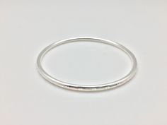 Hi everyone, just wanted to let you know we are open and shipping daily. Etched Silver Bangle Bracelet - 925 Sterling Silver -- Silver Bangles Wears great alone or in multiples. Excellent choice for smaller wrists. Weight: 14 grams Diameter: 2.5 inches Size: 6 inches Silver Hoop Bracelets For Everyday, Silver Bangle Bracelet, Spinning Rings, Pattern Ring, Silver Spinner Rings, Silver Flats, Plain Bands, Silver Bangle Bracelets, Spinner Rings