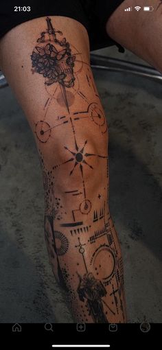 a person with a tattoo on their leg