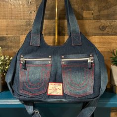 Brand New Denim Hobo Style Shoulder Bag. Red Stitching. True Religion Brand. New. Denim Hobo Bag With Pockets For Travel, Denim Hobo Tote Bag, Casual Denim Hobo Bag With Pockets, Denim Tote Hobo Bag, Denim Hobo Bag With Pockets For Everyday Use, Denim Hobo Tote Bag With Pockets, Everyday Denim Hobo Bag With Pockets, Denim Hobo Shoulder Bag With Pockets, Denim Blue Hobo Bag With Pockets