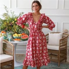 - Ruffled V-Neckline With Tie - Puffed Sleeves - Elastic Waist - Midi Length With Ruffle Hemline - 100% Cotton - Size: Small - Color: Red Zinnia - Approx. Length From Shoulder: 45" - Please Note** Dress Will Come Wrinkled! Also, There Is Discoloration On The Back Neckline & Other Areas Where It Looks Like The Red Bled Onto The White Color. This Mille 'June' Dress Comes In Pre-Owned Condition & Comes From A Pet/Smoke Free Home. Red Midi Dress For Spring Garden Party, Red Knee-length Dress For Brunch, Red V-neck Maxi Dress For Garden Party, Red Bohemian Midi Dress With Ruffles, Red Zinnia, Kiki Dress, Claudia Dress, June Dress, Helena Dress