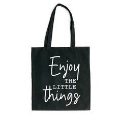 Looking for a cute tote bag to carry all your essentials this summer? This cute Enjoy The Little Things Script bag will be perfect to add to your collection. Perfect for a day at the beach or every day life! Eco-friendly Black Everyday Bag, Casual Black Canvas Bag As Gift, Eco-friendly Black Canvas Bag For Gifts, Eco-friendly Black Bags For Gifts, Eco-friendly Black Bag For Gift, Cute Everyday Tote Bag, Cute Black Canvas Travel Bag, Black Eco-friendly Bag As Gift, Cute Black Canvas Bag For Daily Use