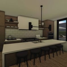 an image of a modern kitchen setting with stools and countertop space in the center