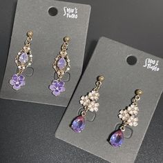 !! ONLY ONE !! ◈ All earrings are unique and are limited  ◈ All materials are from from Japan ◈ 16k Gold ◈ Fashionable accessories ◈ Practically weightless Purple Drop Chandelier Earrings As Gift, Purple Jewelry With Dangling Charms For Gifts, Flower Shaped Crystal Earrings For Gift, Flower-shaped Crystal Earrings For Gift, Flower Shaped Chandelier Earrings For Gift, Dangle Crystal Earrings With Flower Charm As Gift, Gold Crystal Flower Shaped Earrings For Gift, Gold Crystal Flower-shaped Earrings For Gift, Gold Flower Shaped Crystal Earrings For Gift