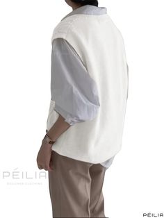 Peilia - Premium Womens Sleeveless Rib Knit Sweater with Stylish V Neck Design Ideal for Spring and Fall Wear White Sleeveless Sweater For Work, White Layering Sweater Vest, White Sleeveless Sweater For Layering, White Crew Neck Sweater Vest, Rib Knit Sweater, V Neck Design, Fall Care, Elegant Fabric, Fall Wear