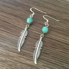 Beautiful Handmade Natural Turquoise & Feather Dangle Earrings. Material: Alloy, Turquoise Check Out My Shop For Unique Jewelry, Crystals And Other Collectibles! Bundle Multiple Listings To Save On Shipping. <3 Boho, Bohemian, Earrings, Dangle Earrings, Indian, Southwestern, Tribal, Western, Feather, Turquoise, Handmade, Unique Indian Beaded Jewelry, Handmade Earrings Diy, Feather Earrings Diy, Simple Bead Earrings, Diy Earrings Dangle, Turquoise Feather Earrings, Turquoise Bead Earrings, Feather Earrings Silver, Earrings Western