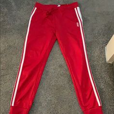 Never Worn Red Justice Pants With White Stripe Going Down The Legs Smoke Free Home Sporty Red Loungewear Bottoms, Red Stretch Sporty Joggers, Sporty Stretch Red Joggers, Red Sporty Pants For Loungewear, Red Stretch Sweatpants With Pockets, Red Sporty Sweatpants For Spring, Sporty Red Sweatpants For Spring, Sporty Red Pants For Spring, Red Sporty Trousers