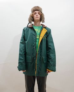 Cool vintage 80s utility dropped shoulder wind breaker jacket in green color. Awesome piece to add some vintage feel to your outfit. Size L, runs big so it could fit XL. Pit to pit measures 52in and length 34in. Size on the label L. No inside material label, feels like polyester. Model usually wears size S and 183cm tall. Great condition, keep in mind that it is vintage item and signs of natural wear/age might appear. If you have any questions about item don't hesitate to message us. When buying Vintage Green Parka For Outdoor, Casual Green Parka For Outdoor Activities, Oversized Green Outerwear For Outdoor, Vintage Green Parka For Streetwear, Oversized Green Utility Outerwear, Retro Winter Utility Jacket For Outdoor, Green Utility Windbreaker For Fall, Vintage Oversized Outerwear For Outdoor, Green Utility Outerwear For Outdoor