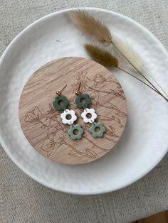 Leafy Green Floral Dangle Earrings. If you would prefer silver or gold connector hoops/stud, let me know in a message once ordered and I can customise this for you.  Polymer clay is wonderfully lightweight.  All earrings are made with surgical steel back & ball posts, hooks or hoops, suitable for most sensitive skin. All earrings are handmade original pieces, which means each piece is unique and one of a kind.  Care Instructions: - Store in a clean, dry place.  - The use of oils, creams, perfume Handmade Green Flower Earrings For Everyday, Everyday Handmade Green Flower Earrings, Personalized White Drop Earrings, Clay Pieces, Handmade Uk, Earrings Polymer Clay, Leafy Greens, Rubbing Alcohol, Gorgeous Earrings