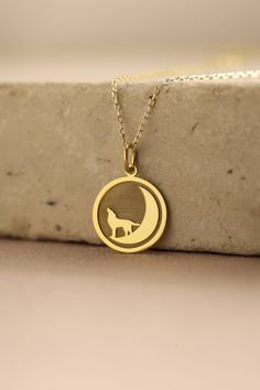 Gold Wolf Pendant - Wolf Gold Necklace ● Material of pendant: Solid Gold 14k ( REAL GOLD ) ● Metal Stamp: 14k ( REAL GOLD ) ● The pendant is available in 5 sizes: - 12,7 mm / 0.5 inches (Diameter) - 14,0 mm / 0,55 inches ( Diameter ) In the photos - 15,3 mm / 0.6 inches ( Diameter ) - 16,5 mm / 0,65 inches ( Diameter ) - 19,1 mm / 0,75 inches ( Diameter ) ( In the photos the size is 14mm / 0.55 inches Diameter ) ( Jump Ring inner diameter: 4 mm ) ● Material of chain: Solid gold 14k ( REAL GOLD ) Gold Engraved Moon-shaped Jewelry, Gold Moon-shaped Engraved Jewelry, Moon Phase Pendant Necklaces For Anniversary, 14k Gold Moon Charm Necklace, Gold Moon-shaped Engraved Necklace, Symbolic 14k Gold Necklace With Moon Charm, Crescent 14k Gold Engraved Necklace, Engraved Moon Shaped Necklace For Anniversary, Engraved Moon Necklace For Anniversary