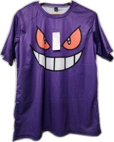 a purple shirt with an evil face on it