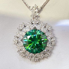 Add a touch of sparkle and shine to your outfit with this Emerald 10 Carat Moissanite 925 Sterling Silver Pendant Necklace. Perfect for any occasion, from casual to elegant. Make a statement without breaking the bank! Pieces: 1-piece Includes: Moissanite jewelry over 0.3 carats includes a certificate of stone properties. Limited warranty included, please contact us for any issues related to your purchase. Material: Platinum-plated, 925 sterling silver, Moissanite Carat weight: 10 Care instructio Stone Properties, Moissanite Necklace, Brooch Necklace, Moissanite Jewelry, Sterling Silver Necklace Pendants, Girls Jewelry, Silver Pendant Necklace, Black Rings, Sterling Silver Pendant