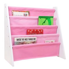 a pink and white book rack with books on it's sides that are open