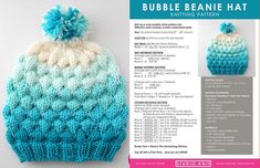 a crocheted hat with a blue and white pom - pom