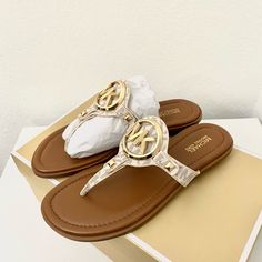 100% Michael Kors Authentic Guarantee And Firm Price! Details New With Box Vanilla Color Gold Tone Hardware Sandal Logo-Print Canvas 89.4% Coated Canvas/9.6% Polyester/1% Polyurethane Lining: Polyurethane Blend Sole: Rubber Open Toe Slip On Imported Flip Flops Michael Kors, Michael Kors Adjustable Sandals For Beach, Michael Kors Adjustable Open Toe Sandals, Michael Kors Trendy Beach Sandals, Trendy Michael Kors Beach Sandals, Trendy Michael Kors Sandals For Beach, Michael Kors Beach Sandals With Cushioned Footbed, Trendy Michael Kors Flat Sandals, Trendy Flat Michael Kors Sandals