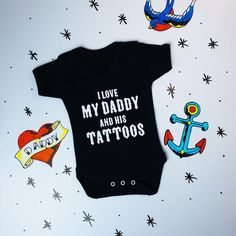 Anyone with kids knows that they love to look over their Daddys tattoos, that’s why this Metallimonsters’ exclusive vest top is the best way to show a softer side to your little monster, yet give a bit of much deserved appreciation to your ink!- 100% cotton unisex vest with 3 button fasteners, printed with 'I love my Daddy and his Tattoos' across chest.- Soft envelope neck opening.- Machine Washable. Maternity Hacks, Babies Stuff, Goth Baby, Future Vision, Rp Ideas, Neutral Baby Clothes, Cool Baby, Baby Announcements