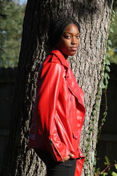 Really cute red biker jacket.  Soft fake lined leather jacket. Three front zip pockets, one snap pocket, turn down collar Adjustable waist, Full sleeve length, last one, XX Large.    The length of the jacket is 27 inches long and so are the sleeves. The bust is 114 centimeters, 45 inches .  Both sleeves have zippers at the lower end. Ship US only   Next day shipping except on weekends.  No returns Red Biker Jacket With Zipper For Streetwear, Red Biker Outerwear For Fall, Edgy Red Leather Outerwear, Red Biker Jacket With Zipper For Fall, Red Biker Jacket With Zipper Closure For Fall, Red Edgy Outerwear With Zipper Closure, Fall Red Leather Jacket With Zipper Closure, Trendy Red Biker Jacket For Streetwear, Edgy Red Spring Outerwear