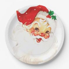 a paper plate with a santa clause on it