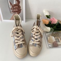 Brand Name: xiangtuibaoUpper Material: CanvasHeel Height: Low (1cm-3cm)Shoes Type: CanvasFashion Element: Mixed ColorsPattern Type: PLAIDLining Material: CanvasInsole Material: HempClosure Type: Lace-upFit: Fits true to size, take your normal size Trendy Beige Flat Sneakers, Casual Beige Round Toe Sneakers, Beige Casual High-top Sneakers With Round Toe, Casual Beige High-top Sneakers With Round Toe, Beige Canvas Shoes With Vulcanized Sole, Casual Summer High-top Sneakers With Round Toe, Casual High-top Sneakers With Round Toe For Summer, Trendy Beige Canvas Shoes For Streetwear, Summer High-top Sneakers With Round Toe And White Sole