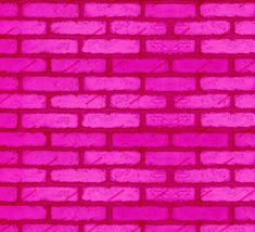 a pink brick wall is shown in this image