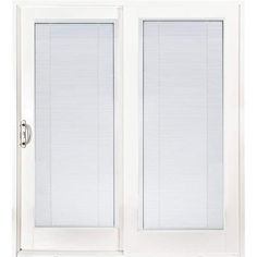 a white double door with blinds on the side