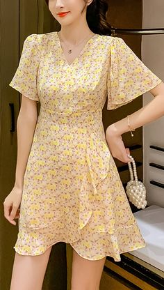 $49.90 -  Cute yellow floral short summer wrap front dress with v-Neck. For elegant ladies, teens and feminine women. Perfect for casual simple summer day outfit. Yellow A-line Mini Dress With Ruffles, Summer Floral Chiffon Dress With Short Sleeves, Yellow Chiffon Mini Dress, Chiffon Mini Dress With Short Sleeves, Elegant Yellow Floral Summer Dress, Yellow Mini Floral Dress For Summer, Yellow A-line Chiffon Dress, Yellow Mini Floral Summer Dress, Yellow Floral Print Mini Dress For Spring