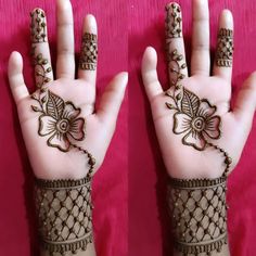 two hands with henna designs on them