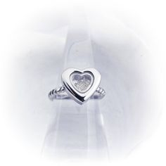 Heart Cremation Ring - Fillable Locket Ring - Heart Urn Ring Cremation Jewelry -Dad Memorial Ring- Child Loss Ring -Mom Memorial Jewelry- Twisted The heart cremation ring has a small screw at the bottom of the heart so you can fill it with your loved one's ashes. The twisted rope band offers comfort as well as fashion. Thos ring is stainless steel and will never tarnish or turn your skin green. The ashes can move around freely or you can fill it completely so they do not move. The ashes can be s Personalized Heart-shaped Stackable Rings For Gifts, Personalized Heart Stackable Rings As Gift, Personalized Heart Stackable Rings For Gifts, Personalized Heart Shaped Stackable Rings As Gift, Silver Heart Cut Ring With Heart Charm, Adjustable Heart Charm Rings For Anniversary, Adjustable Anniversary Rings With Heart Charm, Promise Jewelry For Mother's Day With Open Heart Shape, Promise Jewelry For Mother's Day With Open Heart Design