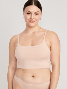 adjustable straps scoop neck 2-ply shelf bra provides light support for a-c cups fitted hits just below ribcage XS = 34A, 32B cup sizes; S = 32C, 34B, 36A cup sizes; M = 34C, 34D, 36B, 36C, 38B cup sizes; L = 34D, 34DD, 36C, 36D, 38B, 40B cup sizes; XL = 38DD, 40D, 40DD cup sizes; XXL = 42D, 42DD cup sizes.  models are approx.  5'9" and wear sizes s (4), l (12), and xl (18)machine wash according to the care instruction label Scoop Neck Stretch Bra With Adjustable Straps, Solid Camisole Bra With Light Support, Camisole Bra With Light Support, Scoop Neck Bra With Adjustable Straps, Crop Top With Adjustable Wide Straps, Solid Camisole With Bra-friendly Wide Straps, Cami Sports Bra With Medium Support, Comfortable Medium Support Cami Sports Bra, Scoop Neck Top With Adjustable Straps And Medium Support