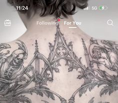 the back of a woman with tattoos on her chest