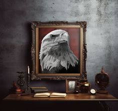 an eagle painting on the wall next to a table with books and other items in front of it