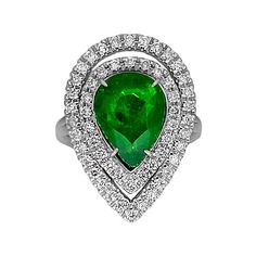 A Breathtakingly Striking  HANDMADE 14k White Gold Ring with Beautiful Pear Cut Tsavorite in Green color! The GEM is 5.24 CT and measures 13.22x9.73x5.34 mm! This Stone will take your breath away, especially on the sunlight! You will want to look at this stone endlessly. The mounting is a masterpiece! HANDMADE 14K White Gold Mounting (tested), that was is custom made to Accommodate this Beauty of a Gem in Prongs setting! Super FINE Workmanship on the Diamond prong  setting with 54 pcs Brilliant Full Cut Diamonds in GH color, SI1 clarity, totaling to approx 0.84 ct! Fabulous Braided Band and Diamond Gallery! The Entire Top's outline is 24.9x18.0 mm- HUGE. The Ring weights 8.5 g, nice and SOLID. Sits 6.7 mm off the top of the finger. Finger size 7 (Free Re-sizing with purchase). Center Stone Green Platinum Gemstones Fine Jewelry, Fine Green Platinum Gemstones Jewelry, Green Diamond Fine Jewelry Gemstones, Formal White Gold Diamond Ring With Tsavorite, Luxury Green Gemstones With Halo Setting, Formal Green Pear-shaped Rings, Gia Certified Tsavorite Diamond Ring For Formal Occasions, Pear-shaped Emerald Ring In Fine Jewelry Style, Fine Jewelry Emerald Ring With Pear Gemstone