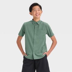 Boys' Textured Woven Shirt - All In Motion™ North Green L Casual Solid Short Sleeve Shirt With Placket, Solid Color Camp Shirt With Short Sleeves, Solid Short Sleeve Camp Shirt With Placket, Collared Shirt For School In Summer, Collared Summer Shirt For School, Green Shirt For School In Summer, Solid Color Cotton School Shirt, Solid Cotton School Shirt, Solid Cotton Shirt For School