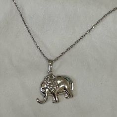 18” Necklace With Elephant Charm Charm Has Cubic Zirconia Detail Perfect Condition Never Worn Bundle & Save!! *Smoke Free Hime* Use My Code Butterfly248 For $10 Off Your First Poshmark Purchase Silver Elephant, Silver Elephants, Elephant Charm, Womens Jewelry Necklace, Charm Necklace, Cubic Zirconia, Elephant, Jewelry Necklaces, Women Jewelry