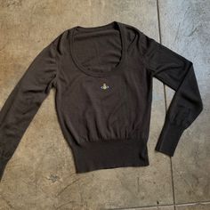 Black Wool Scoop Neck Sweater W/ Embroidered Orb From 2010 . 2010 !!! And Besides That It's Missing The Main Tag It Is In New Condition ! Unfortunately The Size Is On The Main Tag So I Would Estimate It's A Small Or Medium . But The Most Important Tag Is Still On It Which Is The Fabric Tag W/ All The Details . No Flaws On The Garment . You'll Never See It Again Feel Free To Follow Me On Instagram To See Other Items And Look At My Funny Pics And Video Edits <3 @Finalbossstore I’m The #1 Vivienne Vivienne Westwood Sweater, Video Edits, Scoop Neck Sweater, Fabric Tags, Funny Pics, Wool Sweater, Black Wool, Vivienne Westwood, Wool Sweaters