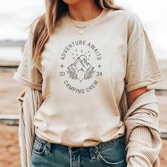 Made from 100% organic ring-spun cotton, this unisex t-shirt is a total must-have. It's high-quality, super comfy, and best of all--eco-friendly. * 100% organic ring-spun cotton * Fabric weight: 5.3 oz./yd.² (180 g/m²) * Single jersey * Medium fit * Set-in sleeves * 1 × 1 rib at collar * Wide double-needle topstitch on the sleeves and bottom hems * Self-fabric neck tape (inside, back of the neck) * Blank product sourced from Bangladesh The sizes correspond to a smaller size in the US market, so Custom Print Crew Neck T-shirt For Camping, Relaxed Fit Letter Print T-shirt For Camping, Outdoor Cotton T-shirt With Custom Print, Graphic Tee T-shirt With Relaxed Fit For Camping, Graphic Tee With Relaxed Fit For Camping, Adventure Crew Neck T-shirt With Custom Print, Custom Print Cotton T-shirt For Adventure, Adventure Custom Print Crew Neck T-shirt, Custom Print Crew Neck T-shirt For Adventure